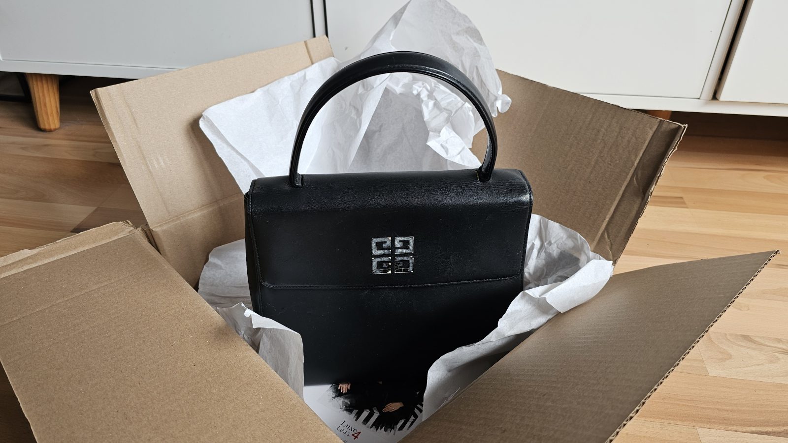 Designertaschen bei Whatnot
